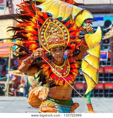 January 24th 2016. Iloilo Philippines. Festival Dinagyang. Unidentified people on parade in carnival costumes. Documentary Editorial Image.