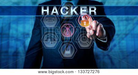Computer security expert pressing HACKER on a virtual touch screen. Cybersecurity and information technology concept for a computer criminal gaining unauthorized access by exploiting weaknesses.