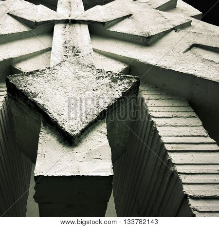 detail concrete abstract sculpture with white paint old