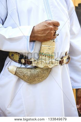 Traditional Omani dagger on a belt - khanjar
