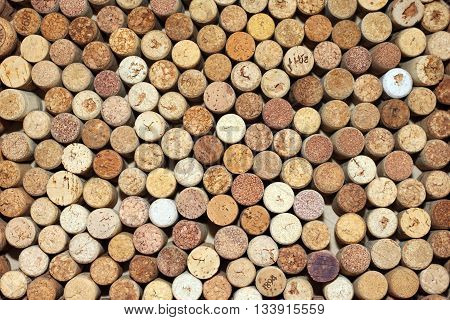 Background of used wine corks, wall of many different wine corks closeup
