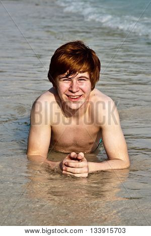 Cute Boy Enjoying The Beac
