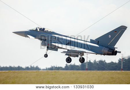 BERLIN / GERMANY - JUNE 3 2016: german eurofighter typhoon lands on airport schoenefeld berlin / germany at june 3 2016.