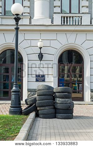 Dnepropetrovsk Ukraine - October 05 2015: Car tires in front of the main entrance in the Dnipropetrovsk regional administration in protest