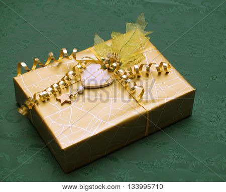 Very luxury packed  gift with heart decoration and gold ribbon