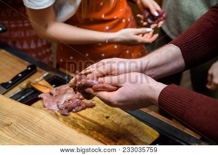 Female Hands Cook Raw Duck Close