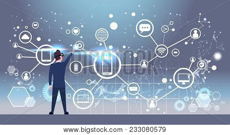 Back Rear View Of Businessman In 3d Glasses Using Futuristic Interface With Social Network Connectio