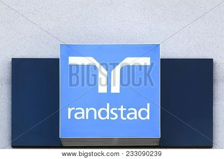 Villefranche, France - March 14, 2018: Randstad Logo On A Wall. Randstad Is A Dutch Multinational Hu