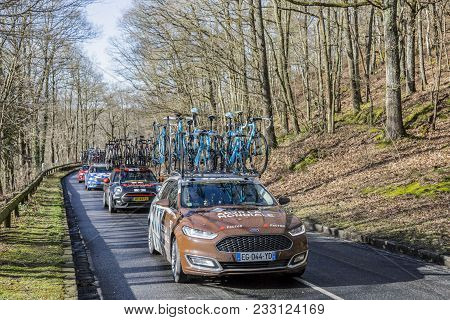 Cote De Senlisse,, France - March 5, 2017: The Technical Car Of Ag2r La Mondiale Team Driving In The