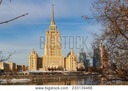 Moscow, Russia - March 25, 2018: Hotel Ukraina On A Blue Sky Background In Spring Morning