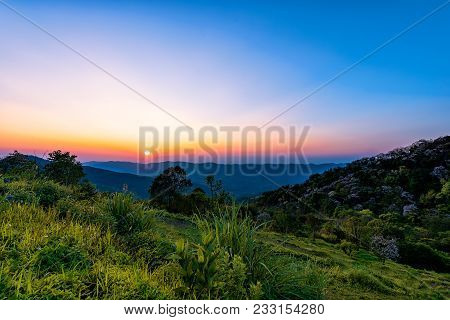 Phu Chi Fah In Chiang Rai,thailand At Sunset.phu Chi Fah, Is A Mountain Area And National Forest Par