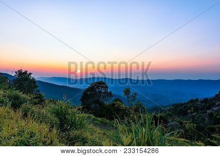 Phu Chi Fah In Chiang Rai,thailand At Sunset.phu Chi Fah, Is A Mountain Area And National Forest Par