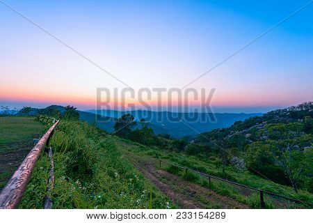 Phu Chi Fah In Chiang Rai,thailand At Sunset.phu Chi Fah, Is A Mountain Area And National Forest Par
