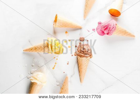 Homemade Chocolate, Vanilla, Berry Ice Cream In Ice Cream Cones, White Marble Background Copy Space 