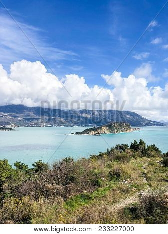 Coastline Of Budva, Montenegro. Adriatic Sea. St.nicholas Island In The Distance