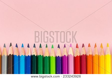 Sharp Color Crayons In Equal Order On Pink Background