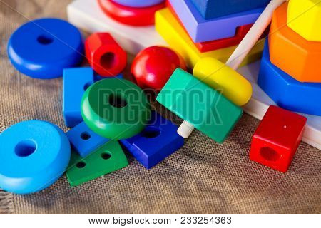 A Wooden Colored Pyramid Toy (learning Developmental)