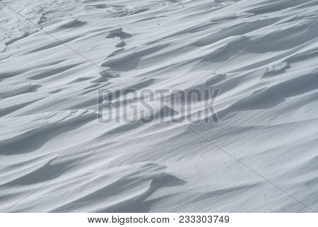 Background - Surface Of Firn Field With Hummocks On The Mountain Slope