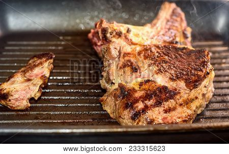Large Piece Of Fresh Beef Meat Prepared On A Grill Pan. .