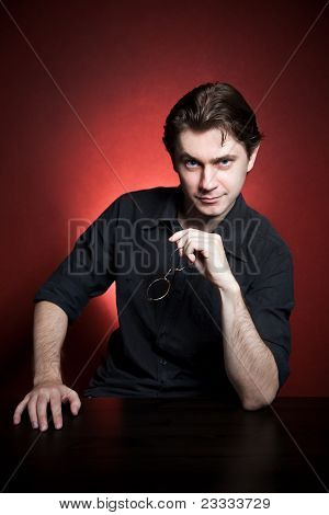 A smart young man smiling