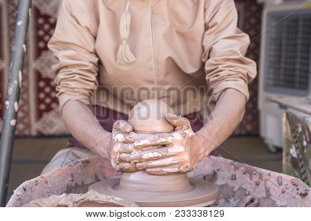 Hands Of An Omani Man  Making A Piece Of Pottery