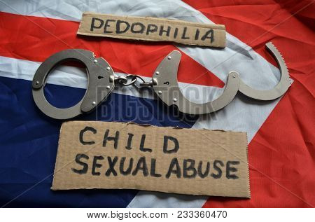 Orphans of JERSEY ISLAND, SCANDAL WITH PEDOPHYLIA concept. British Flag background
