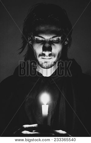 Warlock With A Candle In The Dark Scary Look