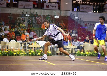 KUALA LUMPUR, MALAYSIA - MARCH 18: Azlan Iskandar, Malaysia (white) plays Aamir Atlas (Pakistan) in the quarterfinals of the CIMB KL Open Championship 2011. March 18, 2011 in Kuala Lumpur, Malaysia.