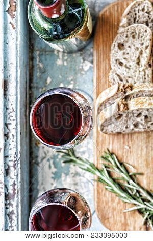 Wine And Bread. View From Above. Seletive Focus. Vintage Background