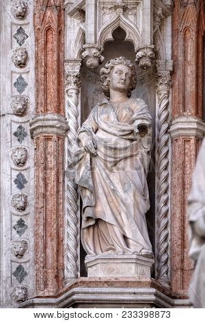 VENICE, ITALY - MAY 28: Statue on the Porta della Carta, detail of the Doge Palace, St. Mark Square, Venice, Italy, UNESCO World Heritage Sites on May 28, 2017.