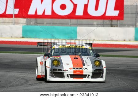 SEPANG, MALAYSIA - 18 juni: The Porsche 911 bil af Hankook KTR sætter i nogle praksis omgange i Sep