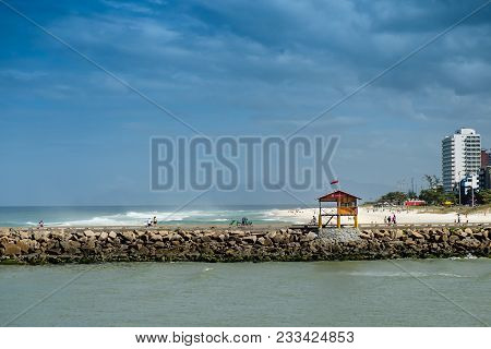 Pier In Barra Da Tijuca Beach, With Lifeguard House. Rio De Janeiro, Brazil