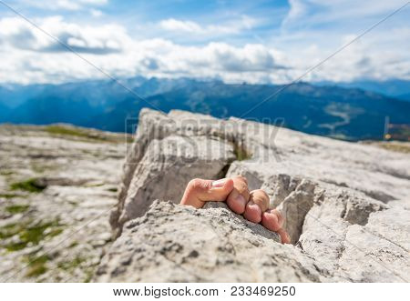 Closeup Of Fingers Gripping A Rock. Climbing Outdoor.