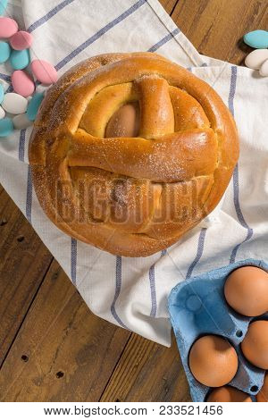 Easter Folar With Egg On Wooden Table Top.