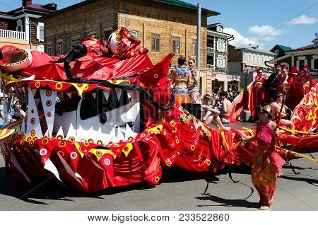Irkutsk, Russia - June,01 2013: Big Car Decorated As Chinese Rred Dragon On City Day Parade. Irkutsk