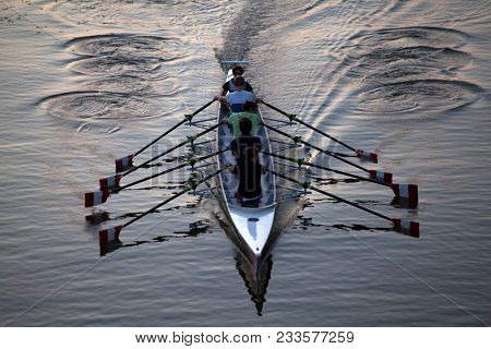 Florence, Italy -  September 26, 2017: Kayakers paddeling on Arno river