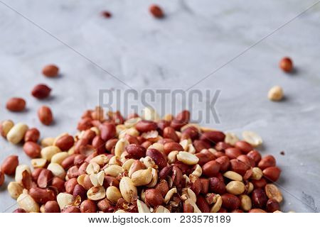 Pile Of Mixed Raw Peelled Peanuts Isolated On White Textured Background, Background, Top View, Close