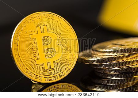 Bitcoin Blockchain  Btc Concept. Golden Bitcoin Coins As Symbol Of Electronic Virtual Money