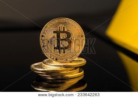 Bitcoin Blockchain  Btc Concept. Golden Bitcoin Coins As Symbol Of Electronic Virtual Money