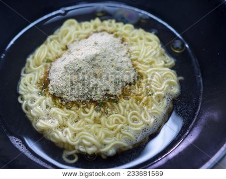 Instant Noodles - Close Up Instant Noodles  With Seasoning In The Bowl