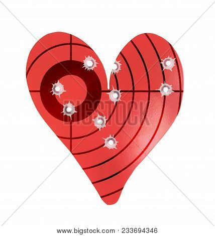 Bulletholes In A Metal Heart-shaped Target