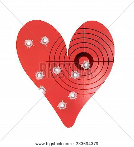 Bulletholes In A Metal Heart-shaped Target