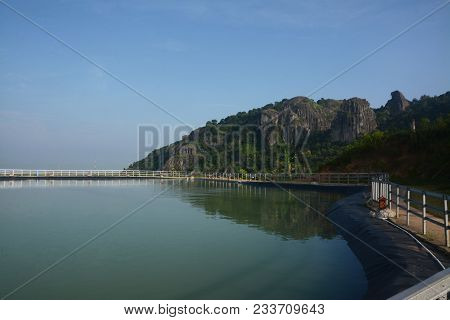 Panoramic Artificial Lake Embung Nglanggeran And Ancient Purba Mountain Nglanggeran As Far Backgroun