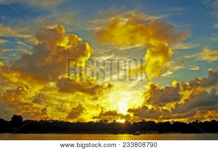 A Spectacular Inspirational Brightly Coloured Cloudy Sea Water Tropical Panoramic Sunrise Seascape F