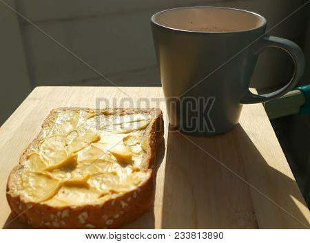 Bread With Magarine Topping And Hot Chocolate