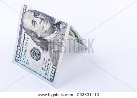 Hundred Dollar Bill Roof Isolated On White Background. Concept Of A Good Investment