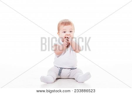 Baby Teething, Boy Sucks His Hands Isolated On White