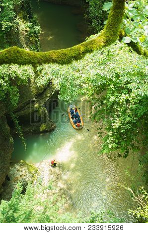 Tourists Sail On A Rubber Boat Along The Canyon Of Martvilli. Georgia, Top View