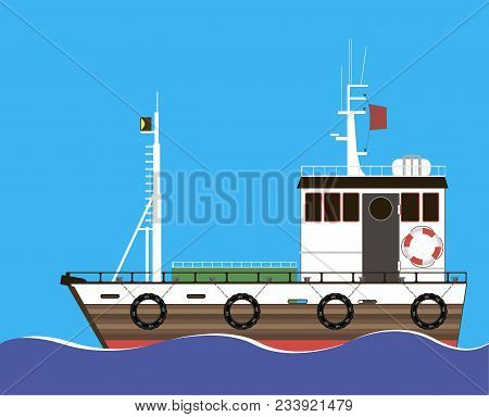 A Sea Towing Ship Is Moving Along The Waves