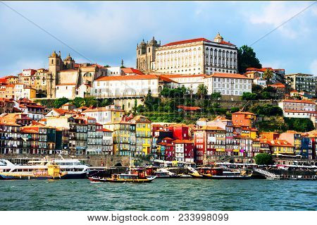 Porto, Portugal. Panoramic View Of Colorful Old Houses Of Porto, Portugal With Douro River. It Is A 
